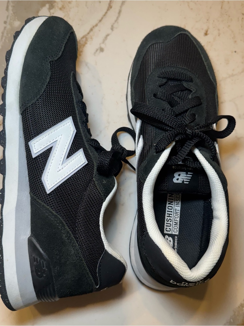 New Balance Black and White women’s 9.5  Classic Sneakers